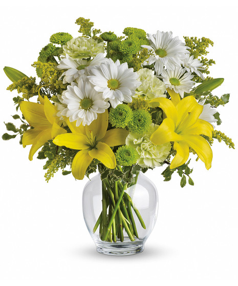 white and yellow flowers in ginger jar