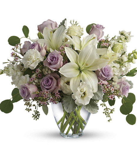 cream flowers accented with lavender flowers