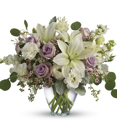cream flowers accented with lavender flowers