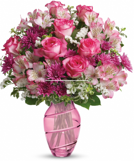 pink floral arrangement in dramatic vase